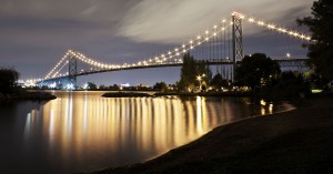 lit up evening image of ambassador bridge
