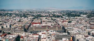 Aerial image of Mexican city with mountains in the distance