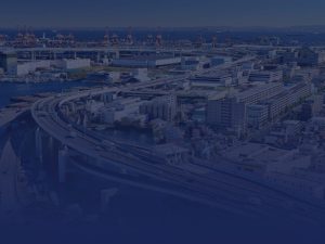 Overview of a highway and apartments in an industrial area