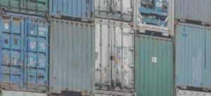 Stacked faded shipping containers